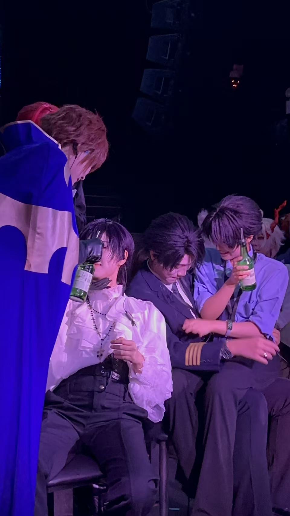 Costumed guests sharing an interaction